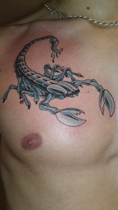 Blue Ink Crab Tattoo On Man Chest