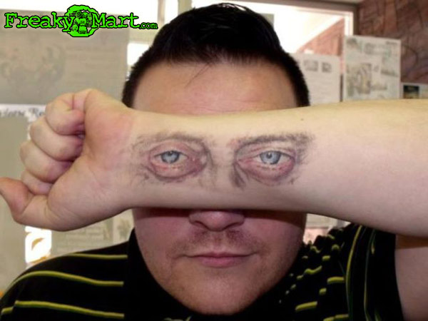 Classic Two Eye Tattoo On Forearm