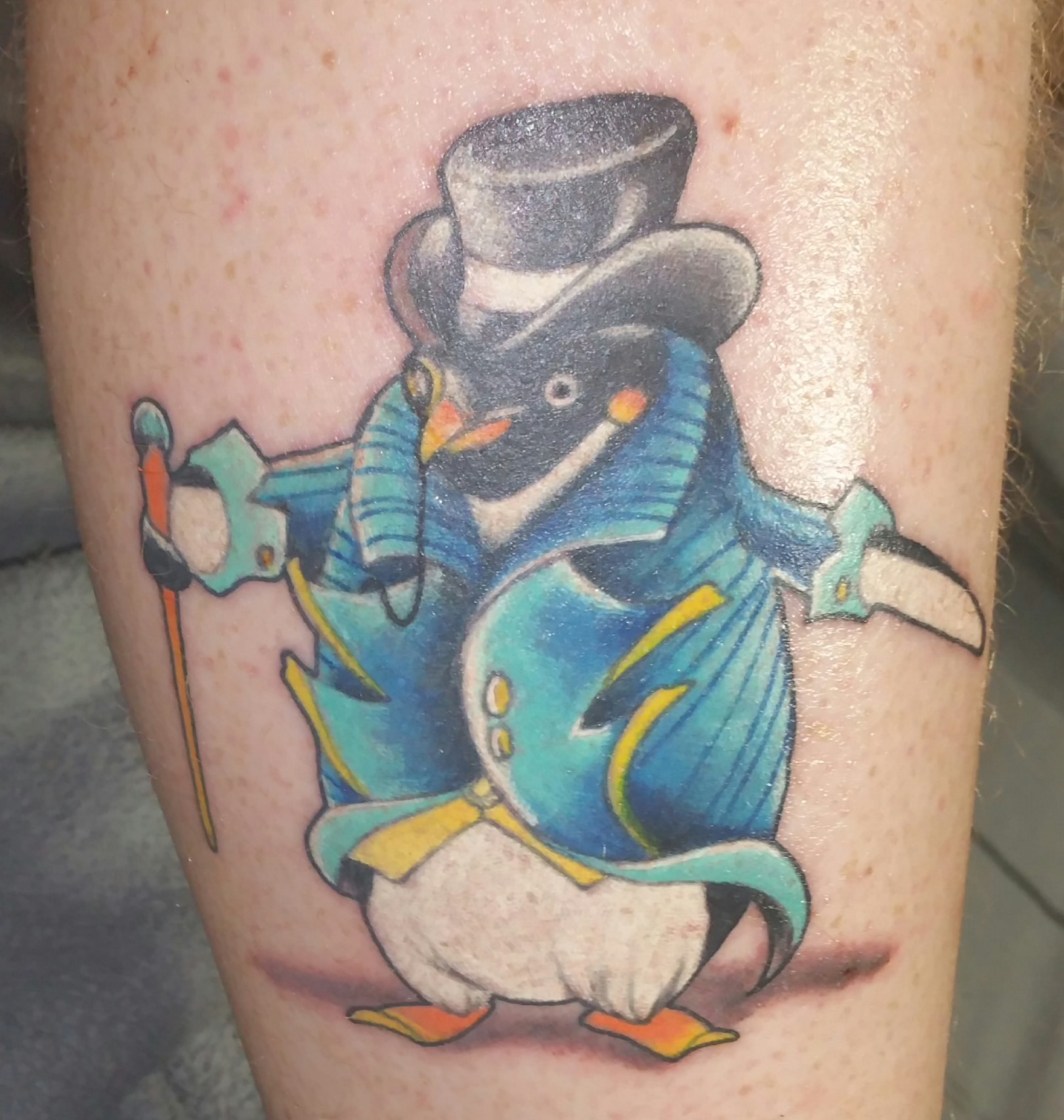 Colorful Gentle Penguin Tattoo