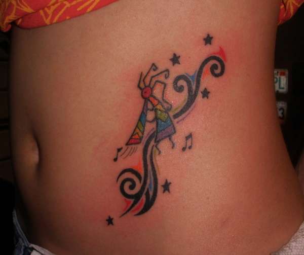 Colorful Kokopelli Tattoo On Side Rib