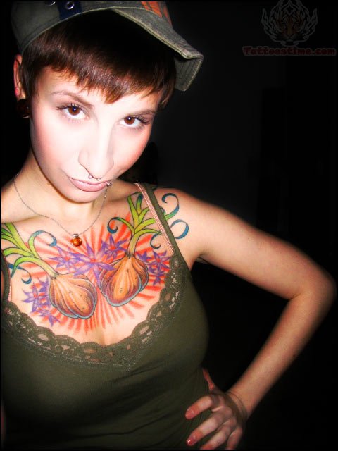 Colorful Two Garlic With Flowers Tattoo On Girl Chest