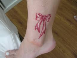 Cool Pink Ink Ribbon Bow Tattoo On Leg