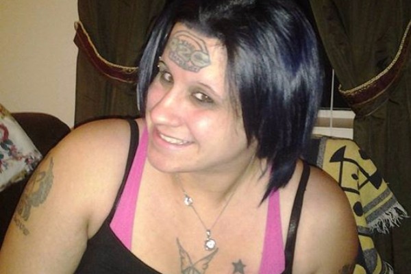 Crazy Woman With Forehead Tattoo