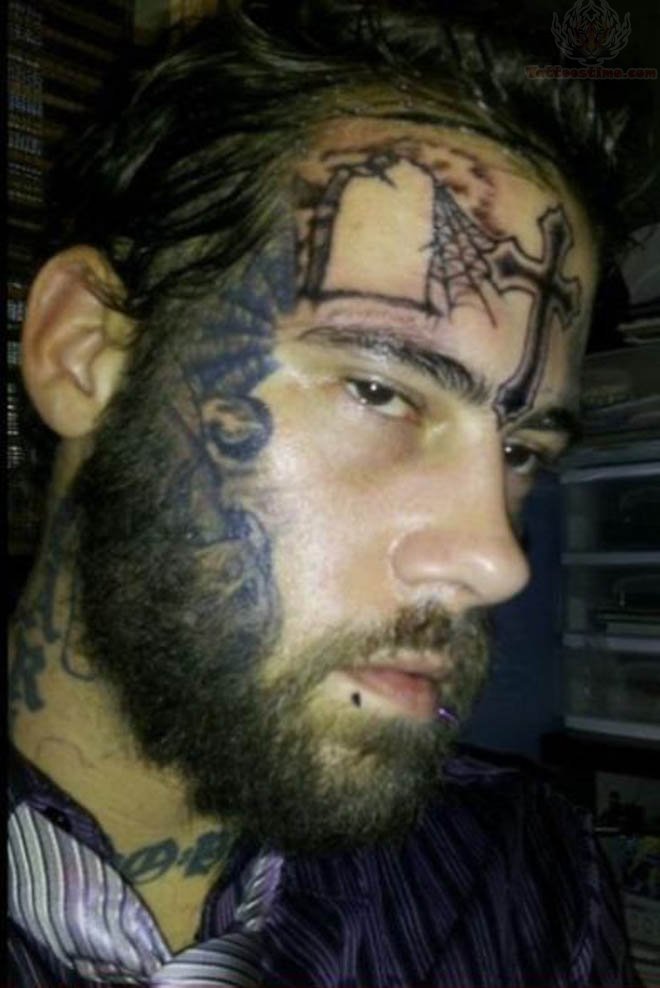 Cross And Spider Web Tattoo On Guy Forehead