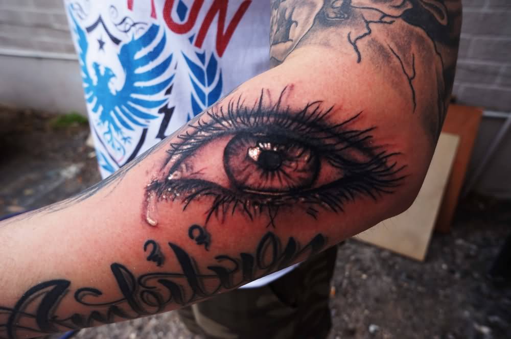 Crying Eye Tattoo On Forearm
