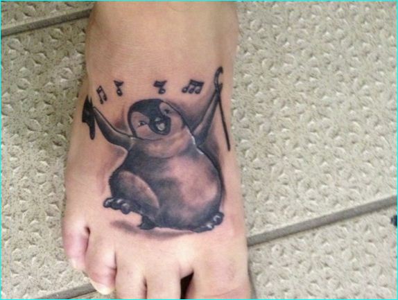 Dancing Penguin Tattoo On Right Foot