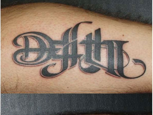 Death Lettering Tattoo Design For Leg