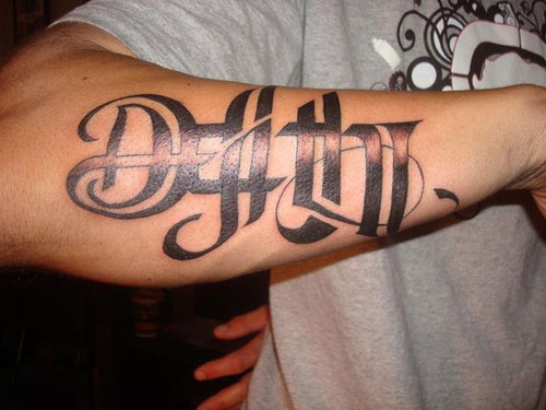 Death Lettering Tattoo On Forearm