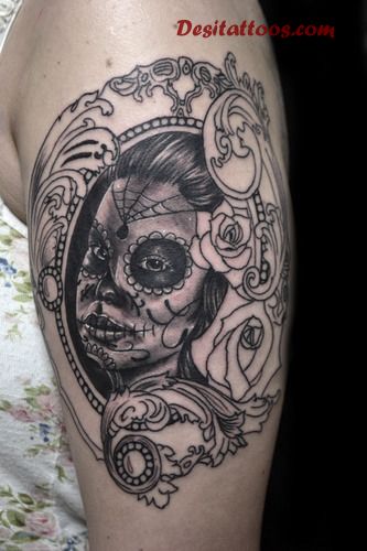 Dia De Los Muertos Pin Up Girl Face In Frame Tattoo On Half Sleeve