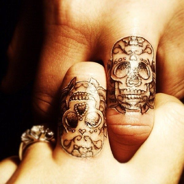 Dia De Los Muertos Skull Tattoo On Couple Finger