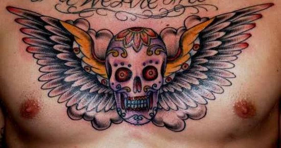 Dia De Los Muertos Skull With Wings Tattoo On Man Chest