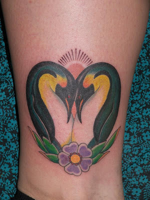 Flower And Penguin Tattoo On Leg