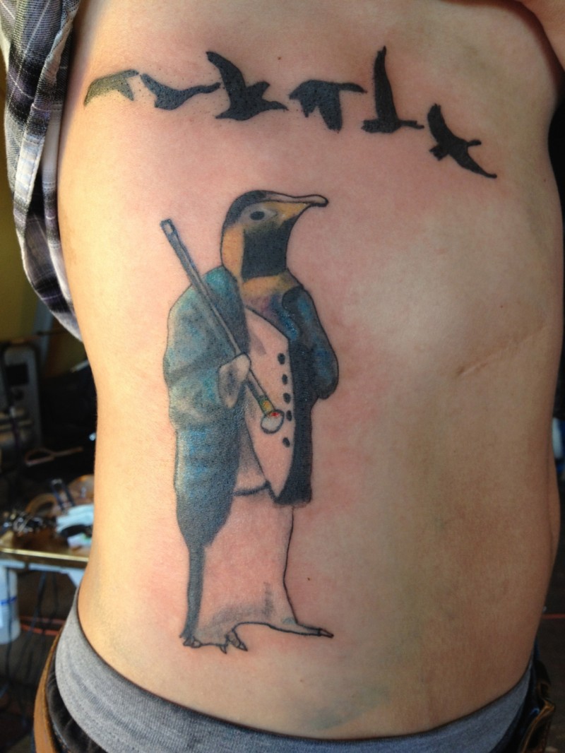 Flying Birds And Penguin Tattoo On Side Rib