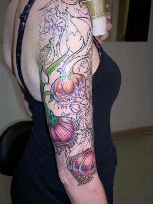 Garlic Tattoo On Right Half Sleeve