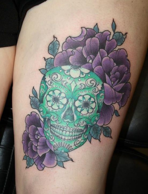 Green Ink Dia De Los Muertos Skull With Flowers Tattoo Design For Thigh