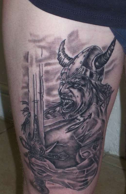 Grey Ink Viking Tattoo On Leg