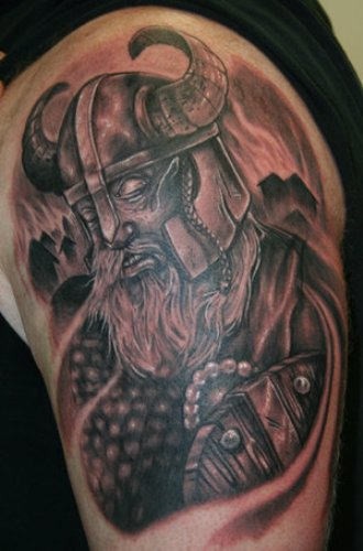Grey Ink Viking Tattoo On Shoulder