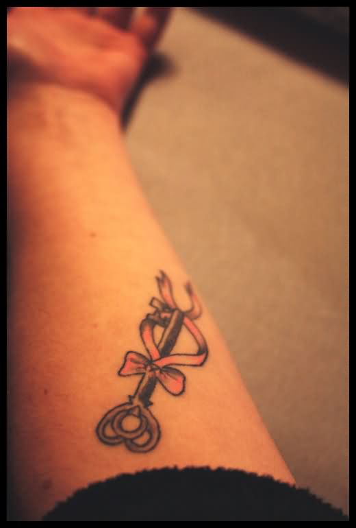 Heart Key With Ribbon Bow Tattoo On Forearm