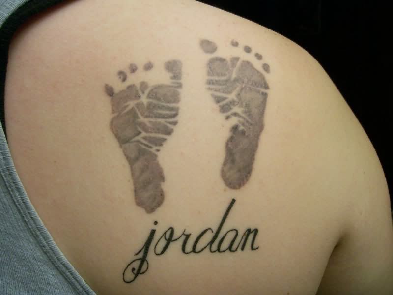 Jordan - Black Footprints Tattoo On Right Back Shoulder
