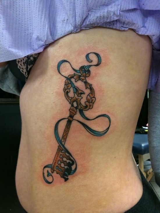 Key With Ribbon Tattoo Design For Side Rib