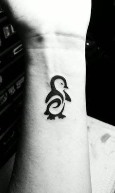 Left Wrist Simple Tribal Penguin Tattoo