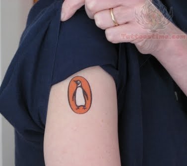 Linkin Park Penguin Tattoo On Bicep