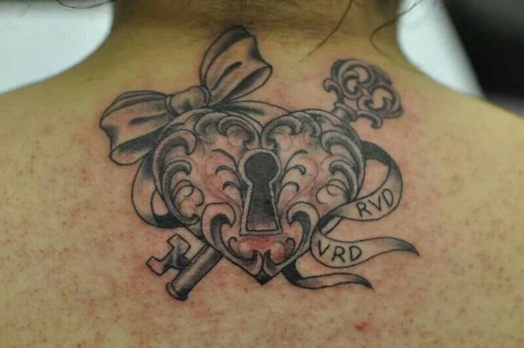 Lock And Key With Ribbon Bow Tattoo Design For Upper Back