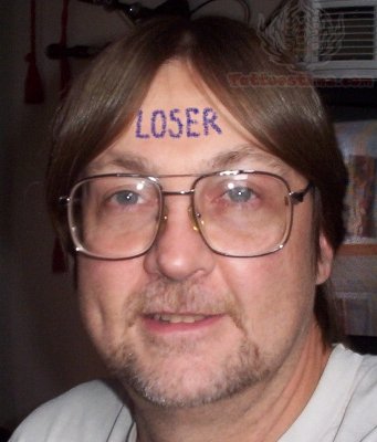 Loser Tattoo On Forehead