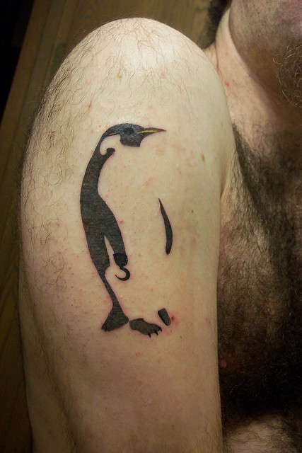 Man Right Shoulder Penguin Tattoo On Half Sleeve