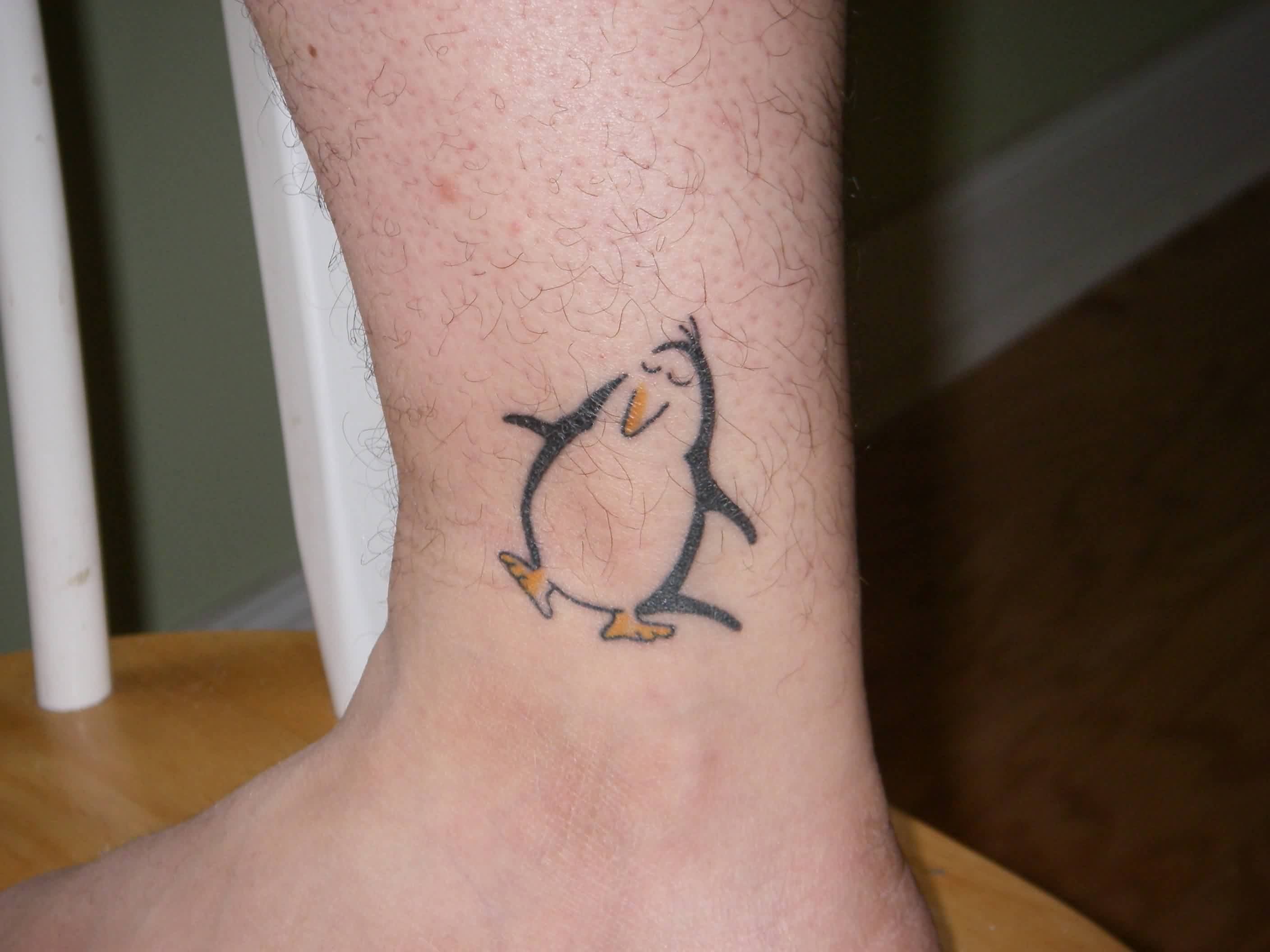 Nice Outline Penguin Tattoo On Leg