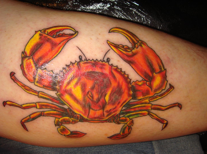 Orange Ink Crab Tattoo On Leg Sleeve
