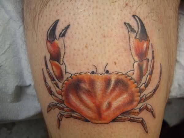 Orange Ink Crab Tattoo On Leg