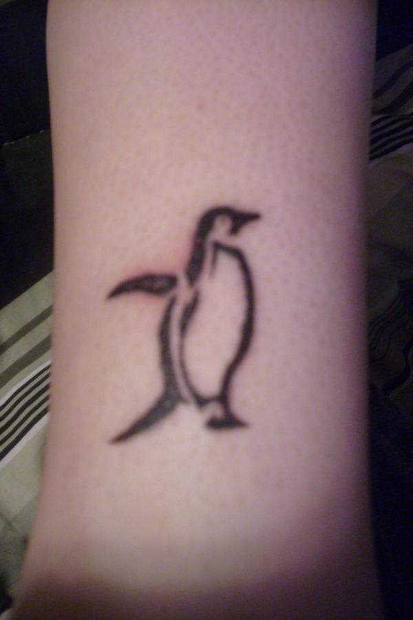 Outline Penguin Tattoo On Wrist