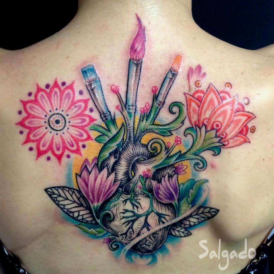 Paintbrush And Pencil With Flowers Tattoo Design For Upper Back