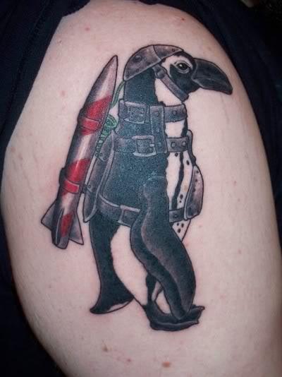 Penguin Commando Tattoo On Shoulder