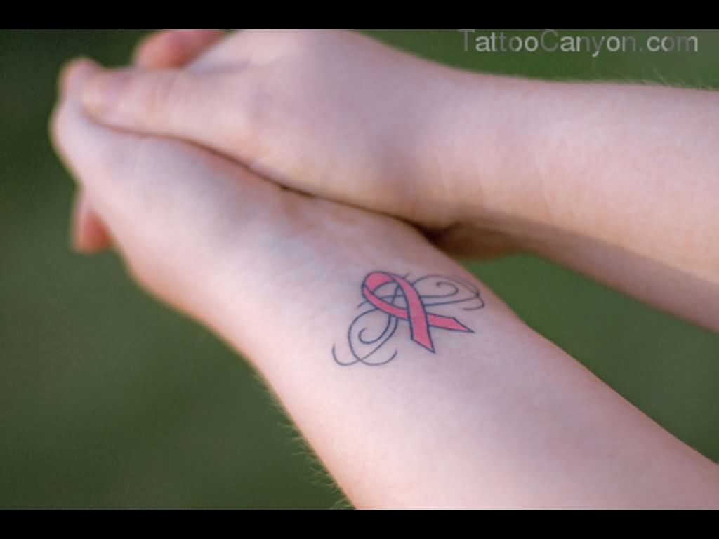 Pink Cancer Ribbon Tattoo On Wrist