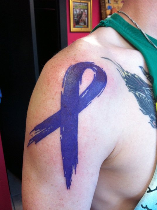 Purple Cancer Ribbon Tattoo On Right Shoulder
