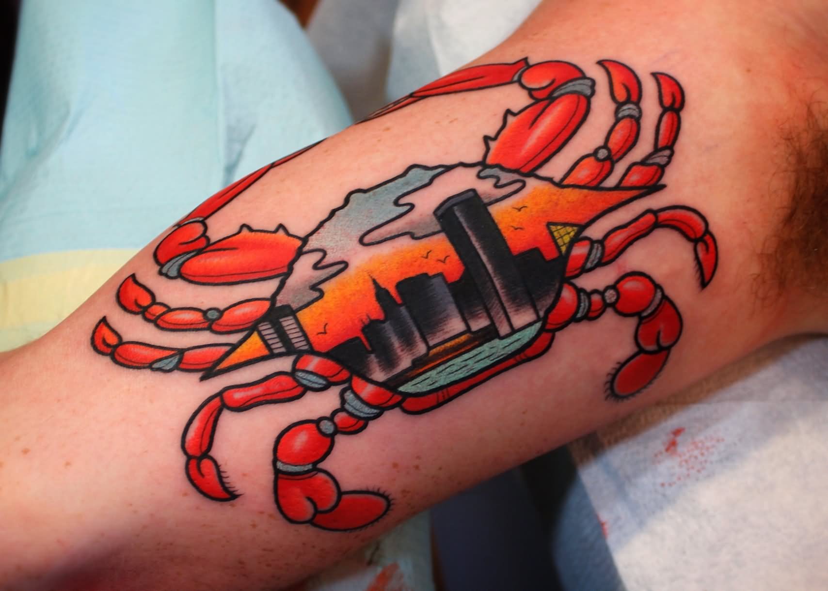 Red Crab Tattoo On Inner Bicep