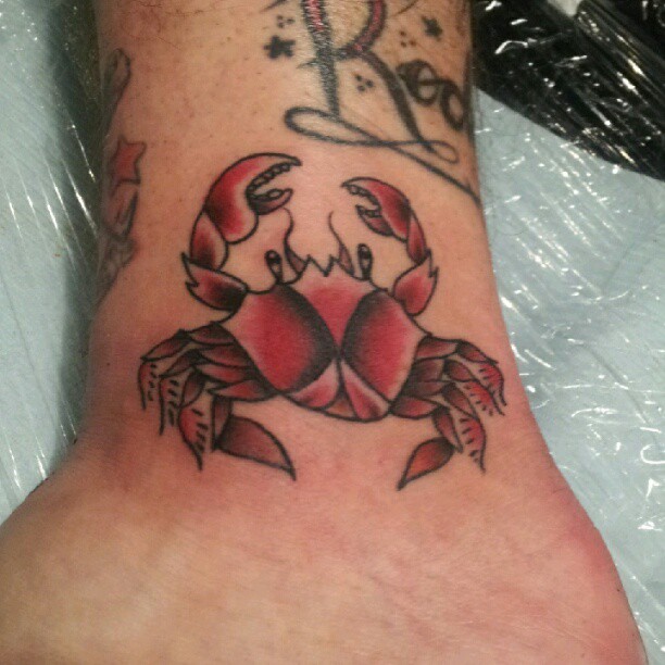 Red Ink Crab Tattoo On Ankle