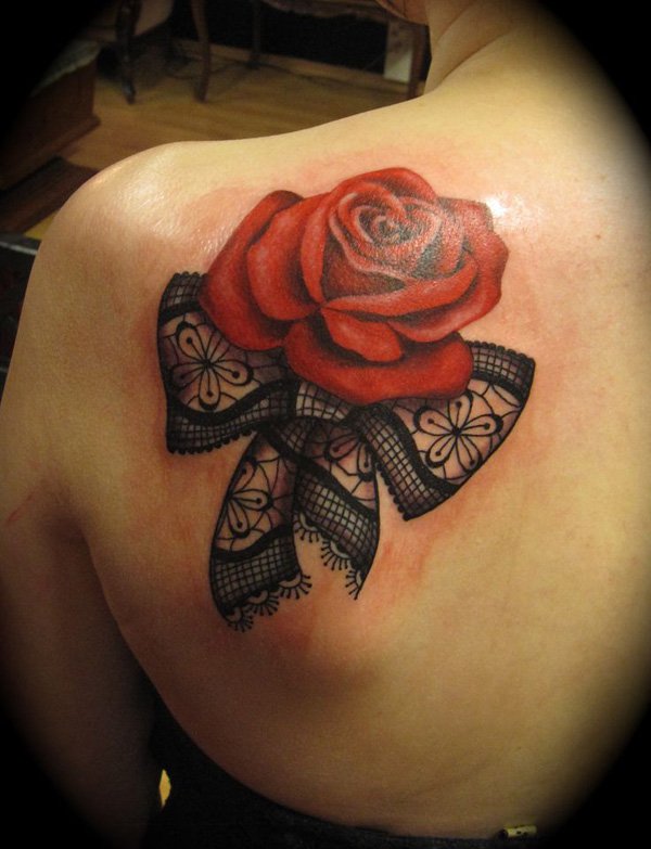 Rose With Lace Ribbon Bow Tattoo On Left Back Shoulder