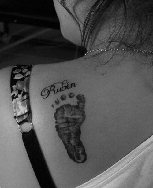 Rubin - Black Foot Print Tattoo On Left Back Shoulder