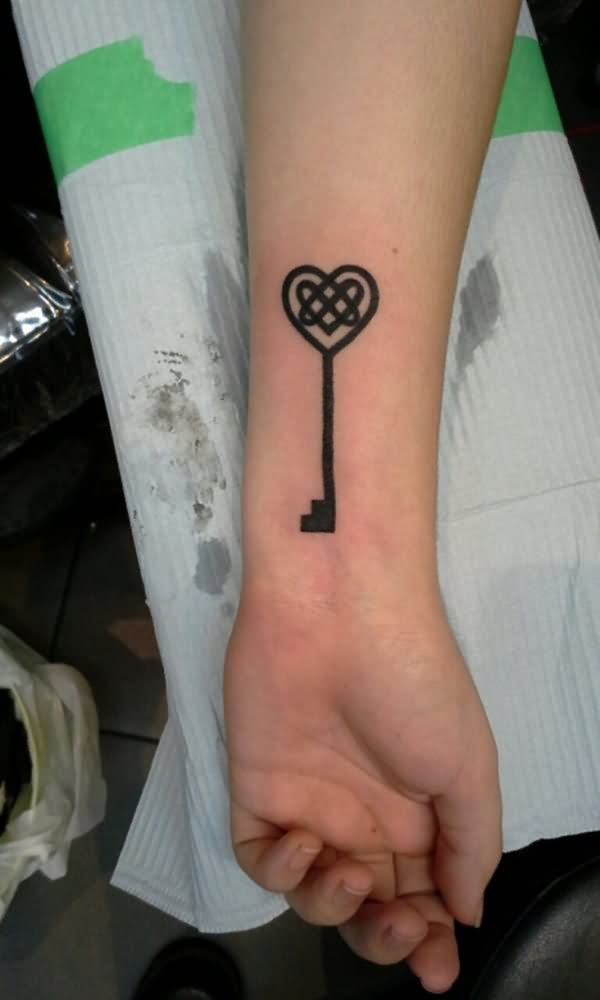 Simple Black Heart Key Tattoo On Wrist