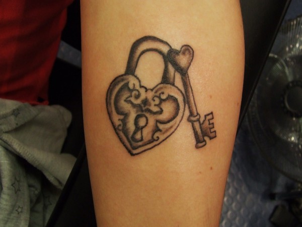 Simple Black Ink Heart Lock And Key Tattoo Design