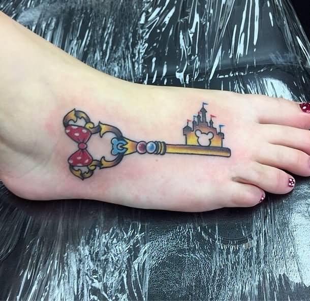 Simple Colorful Disney Key Tattoo On Girl Foot