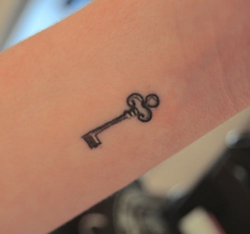 Simple Little Black Key Tattoo Design For Wrist