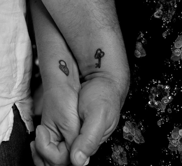 Simple Lock And Key Tattoo On Couple Wrist