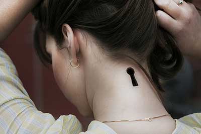Simple Silhouette Key Hole Tattoo On Back Neck