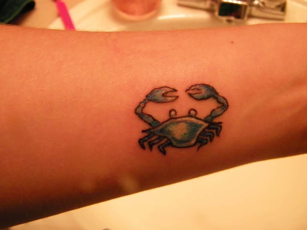 Small Blue Crab Tattoo On Forearm