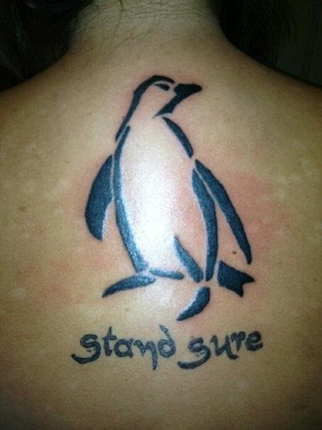 Stand Sure Penguin Tattoo On Back