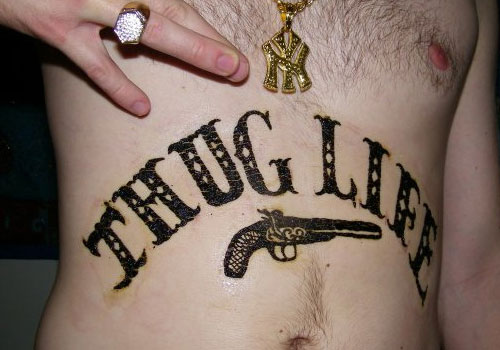 Thug Life – Black Gun Tattoo On Stomach